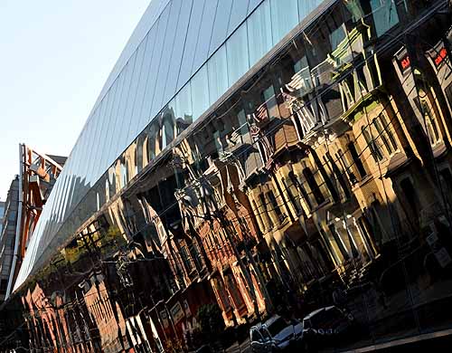 Second Empire block on Dundas Street Toronto reflected in the stunning facade of Frank Ghery's AGO